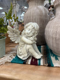 KJ cherubs sitting