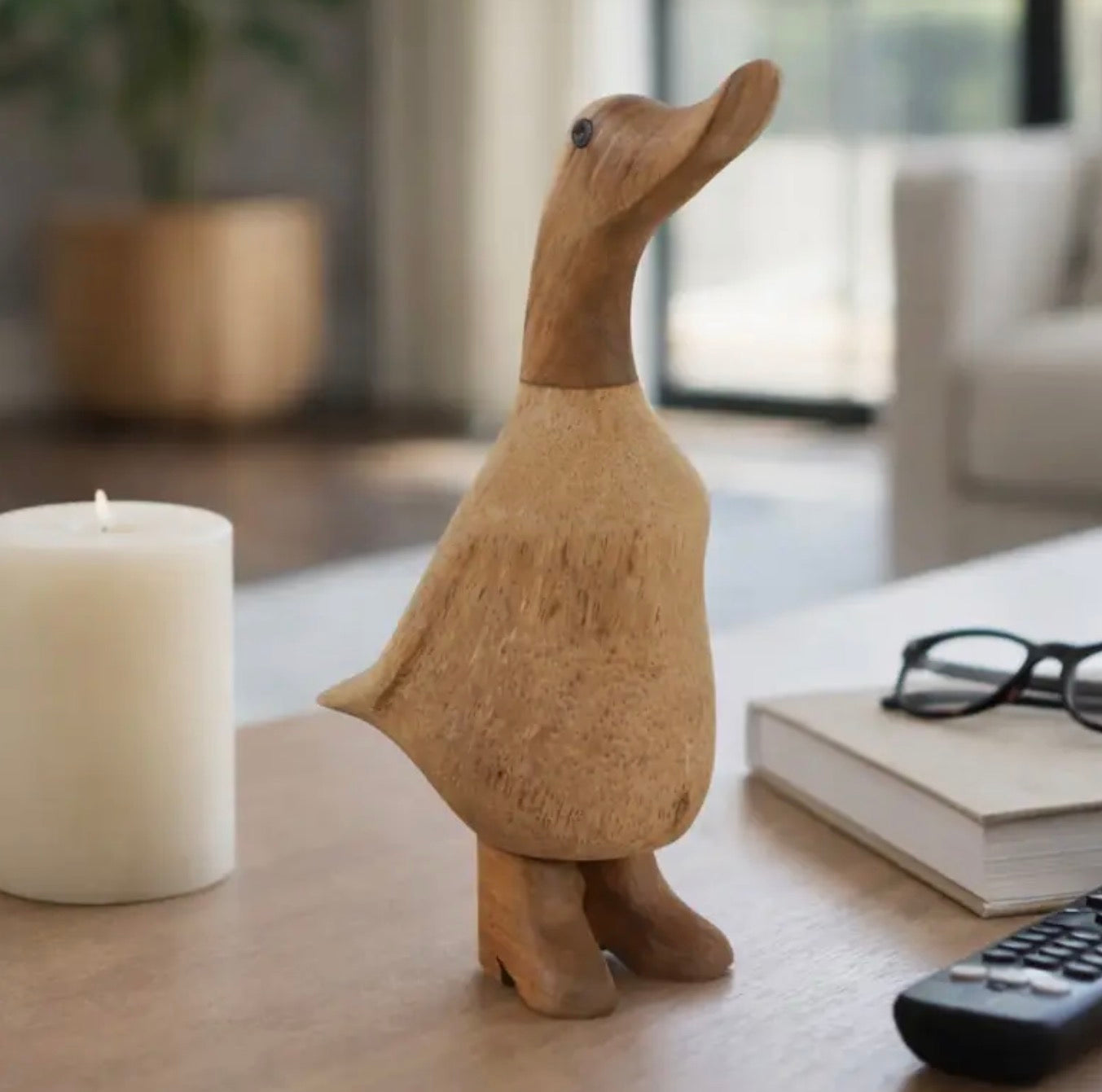 Wooden duck with boots