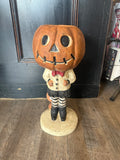 Pumpkin boy with striped leggings candy dish