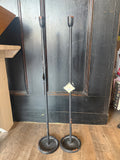 Black Newton taper candlesticks